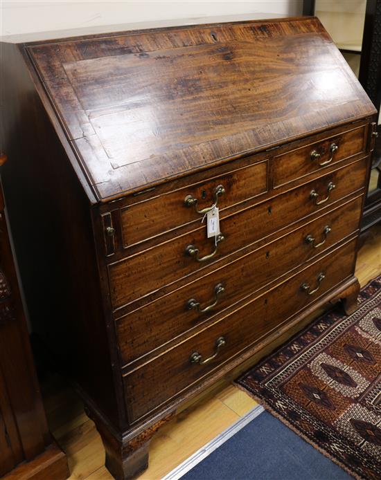 A George III mahogany bureau, W.111cm